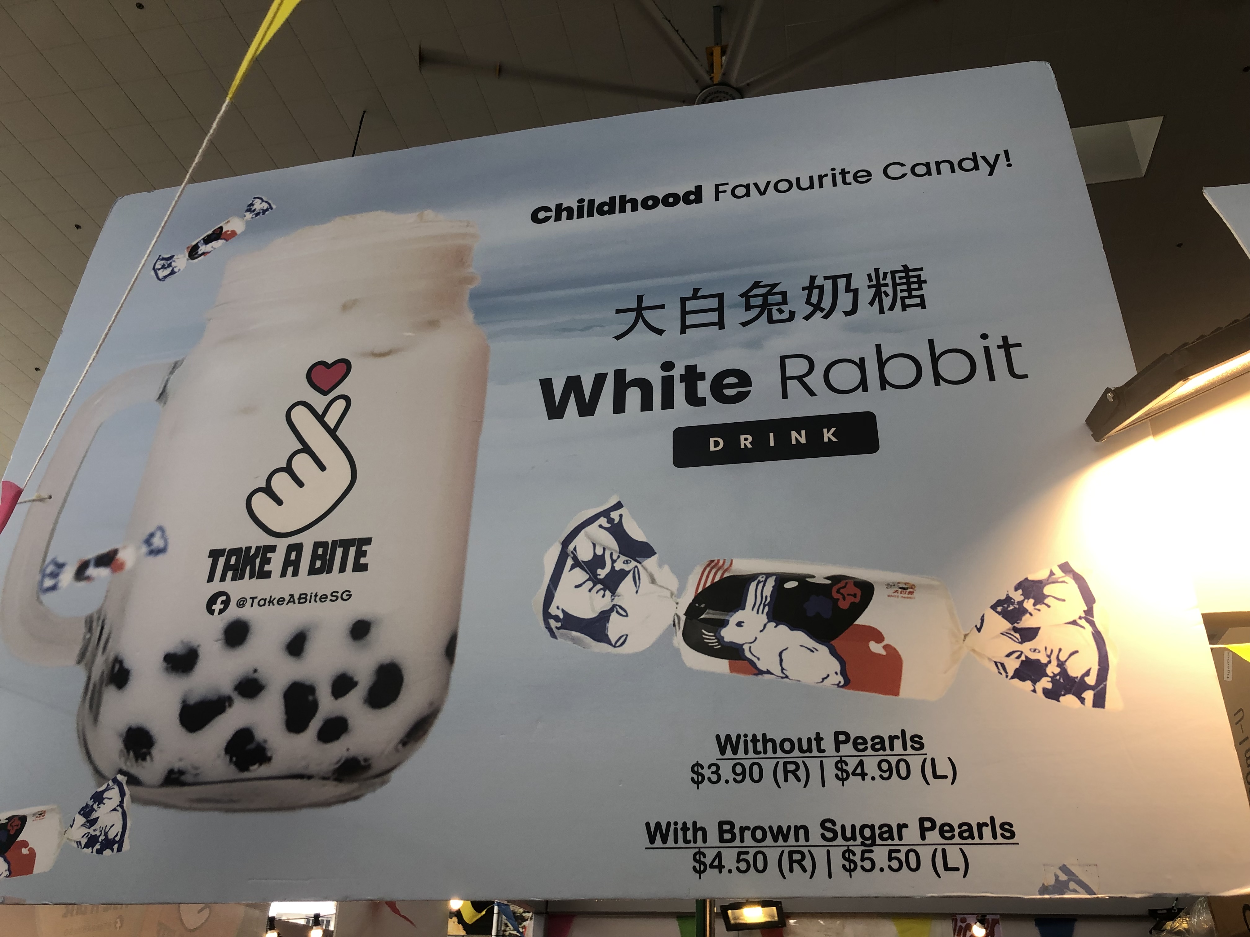 There is a pop-up store selling White Rabbit Bubble Milk outside Bedok Mall - 3