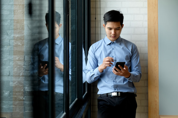 asian-man-using-mobile-phone