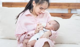 young-asian-mother-holding-newborn-baby