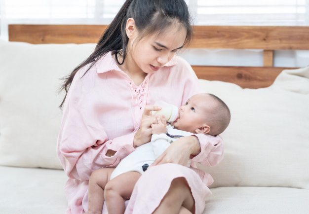 young-asian-mother-holding-newborn-baby