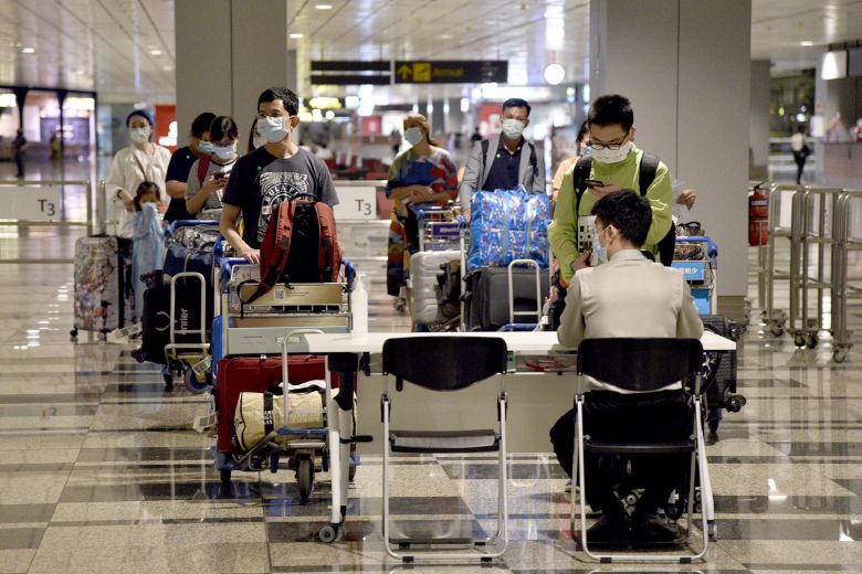 travellers entering Singapore amid COVID-19