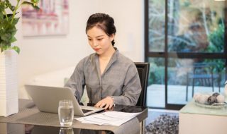 woman using her laptop