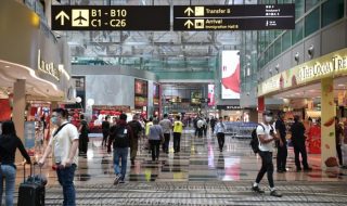 Changi Airport with people in masks