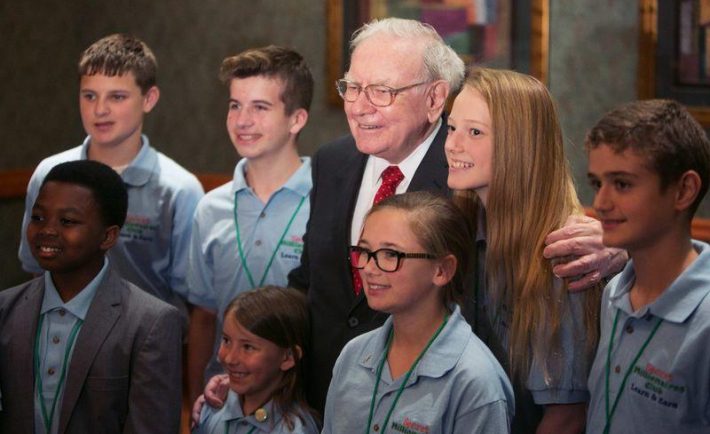 Warren Buffet with young people