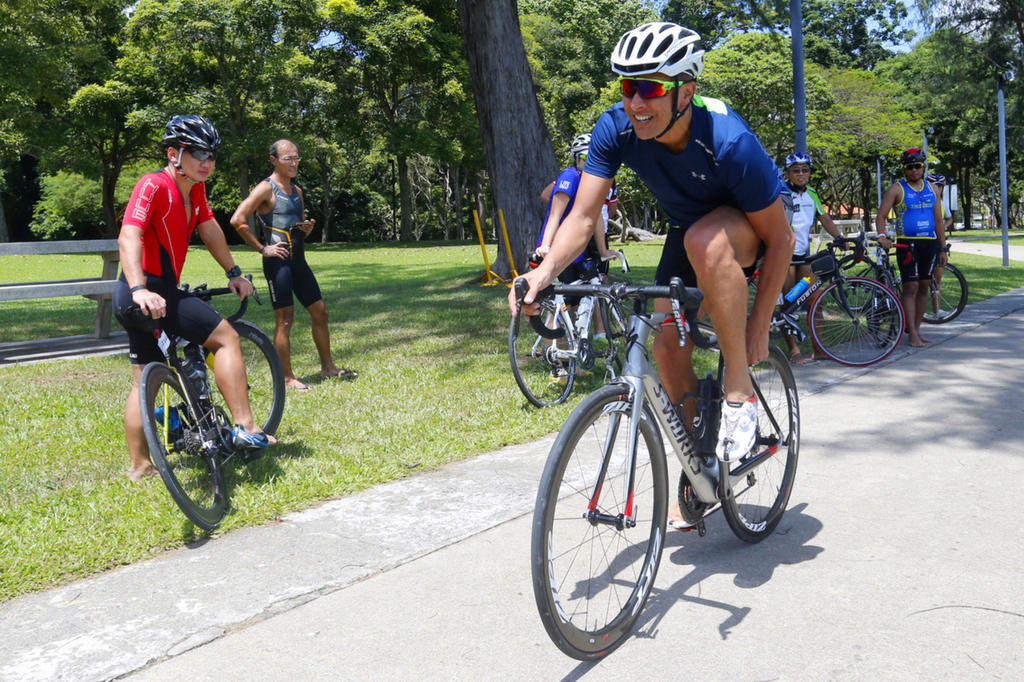 a group of men cycling