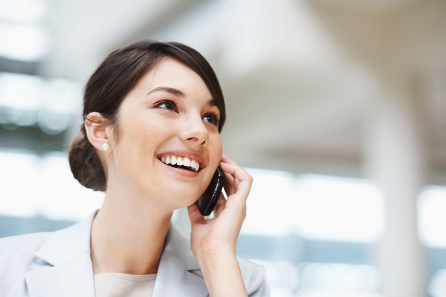 a lady making a phone call