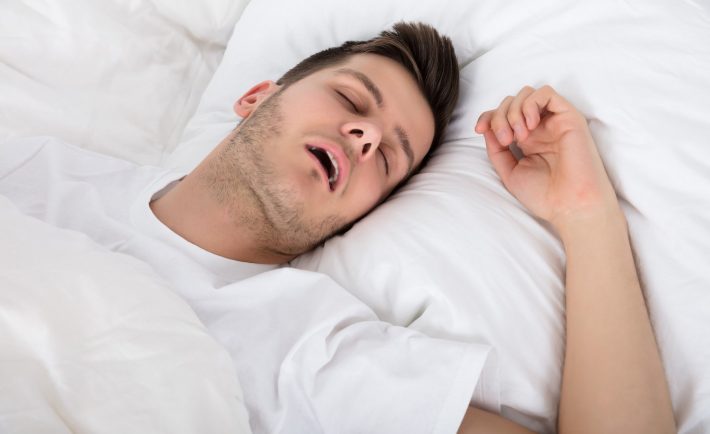 man sleeping with mouth open