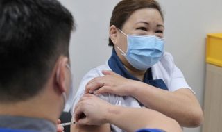 a lady getting vaccinated