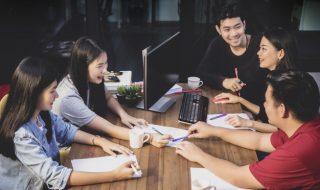 asians having an office meeting