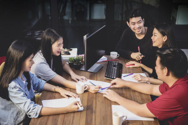 asians having an office meeting