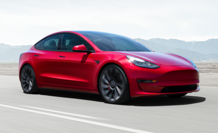 Tesla Model 3 in red Tesla Model 3 in red
