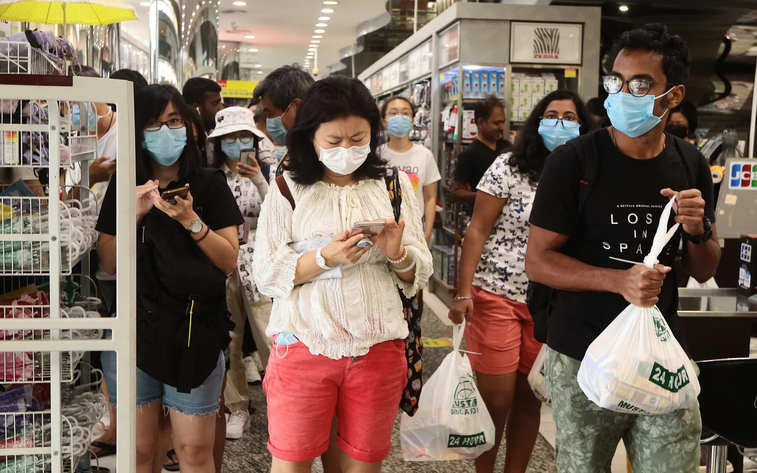 a woman using her phone in Singapore