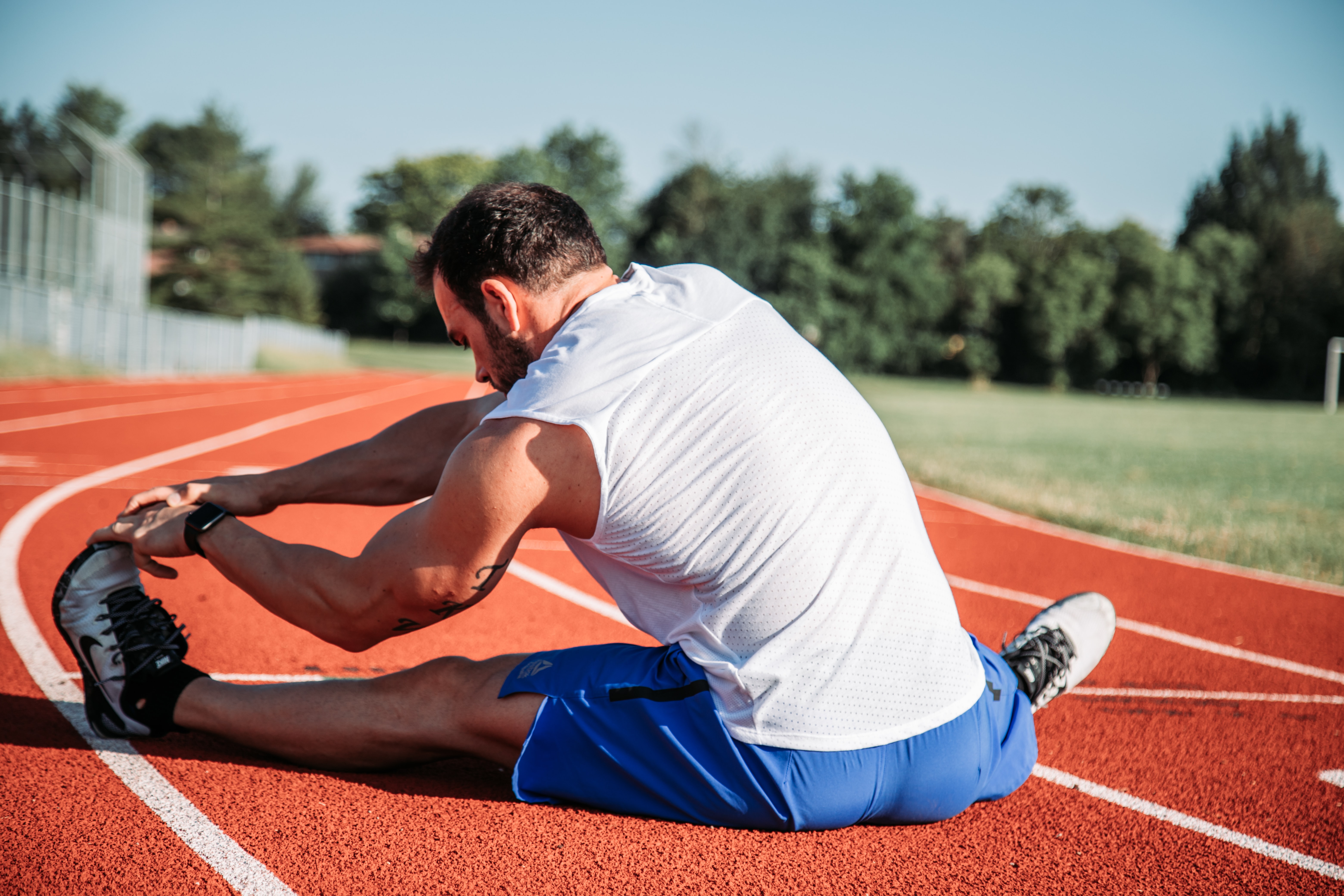 a man stretching before a run