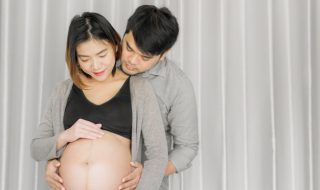 asian-young-pregnant-woman-with-her-husband