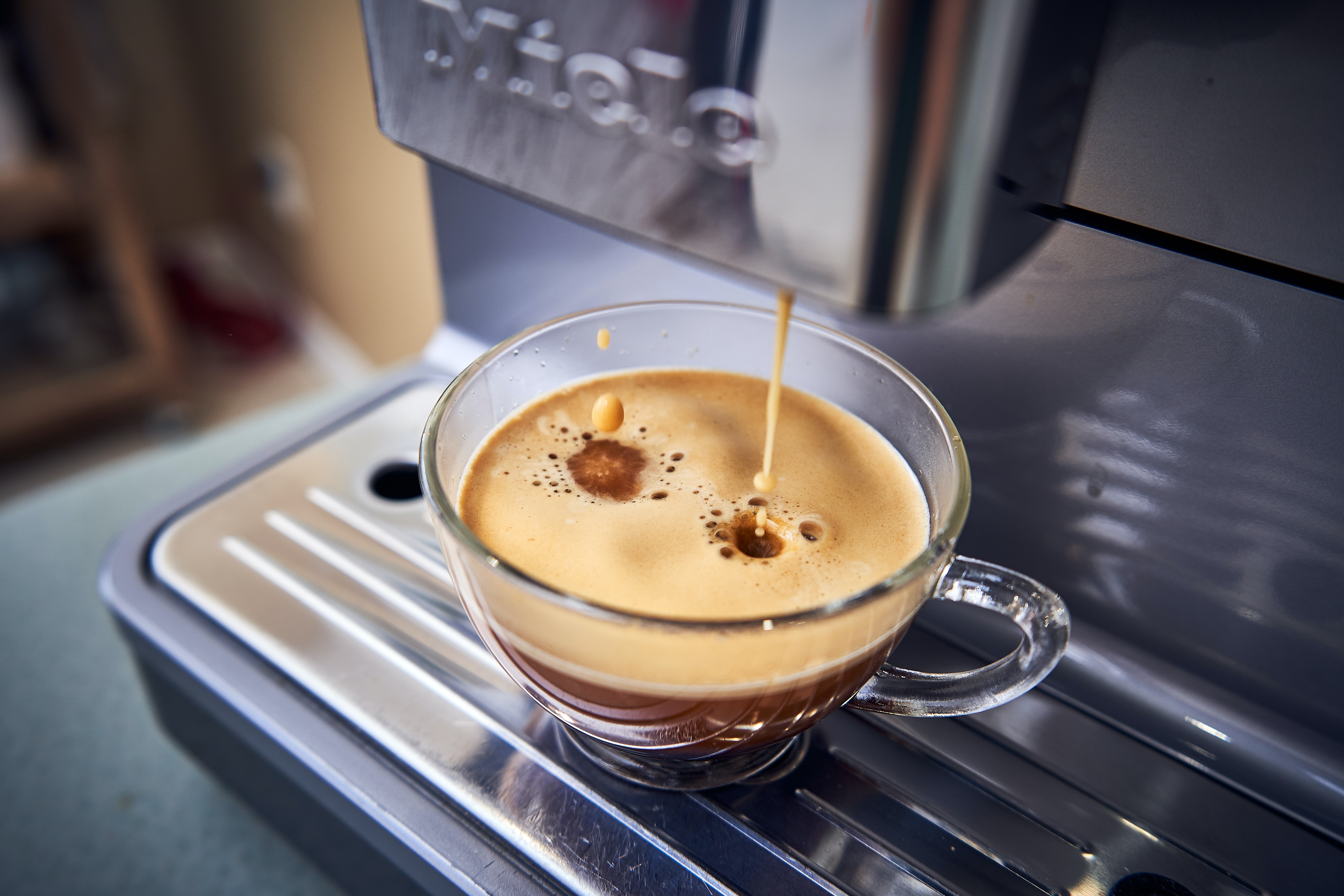 a machine dispensing coffee