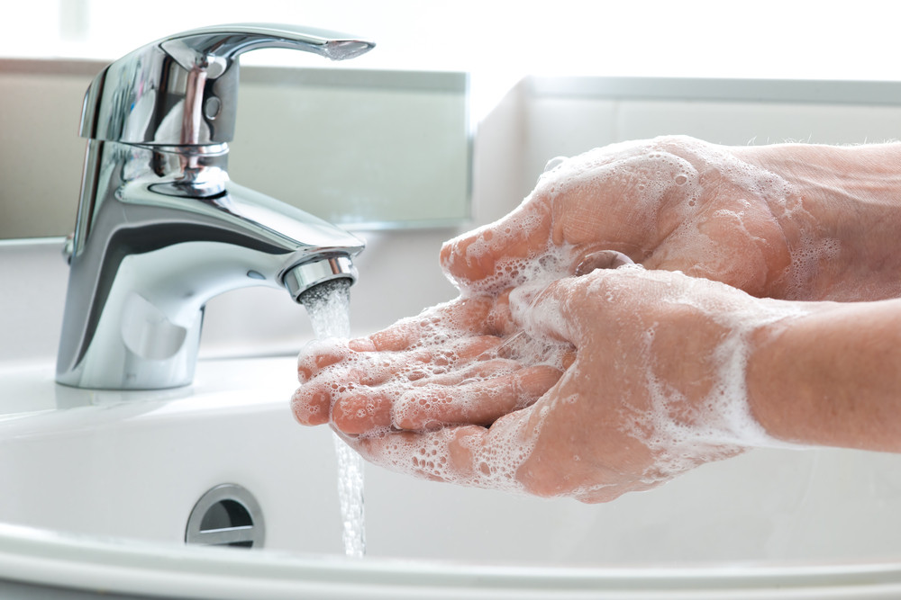 a person washing hands