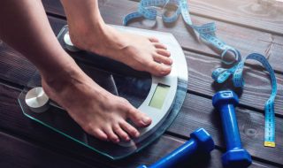 a person standing on a weighing scale