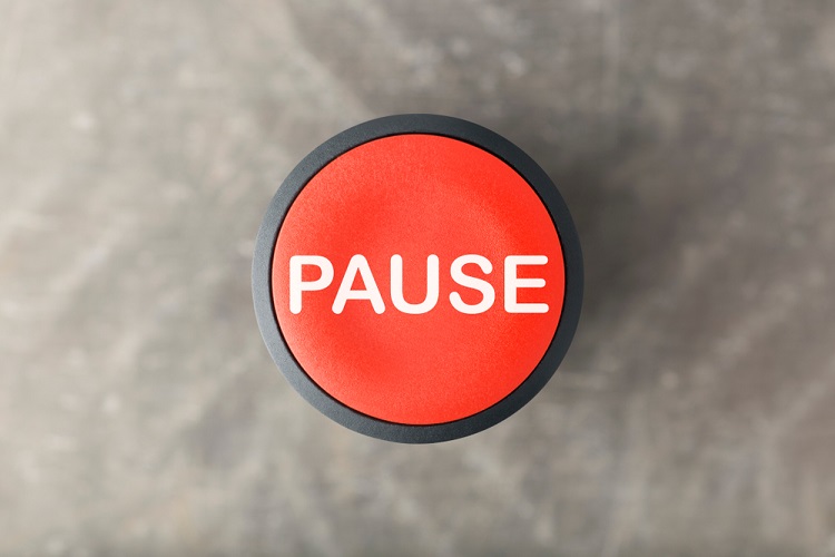 a red pause button