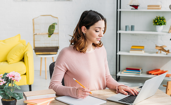 a woman working on her laptop