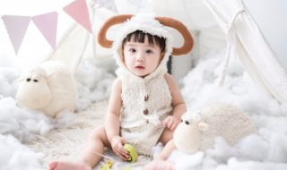 a child in a goat costume