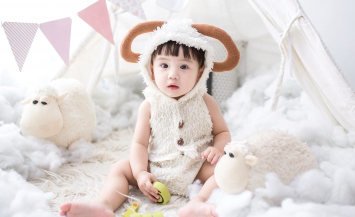 a child in a goat costume