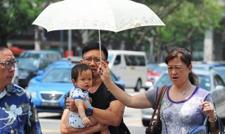 Singaporeans weathering the hot temperatures