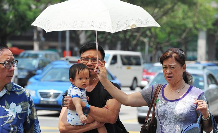 Singaporeans weathering the hot temperatures