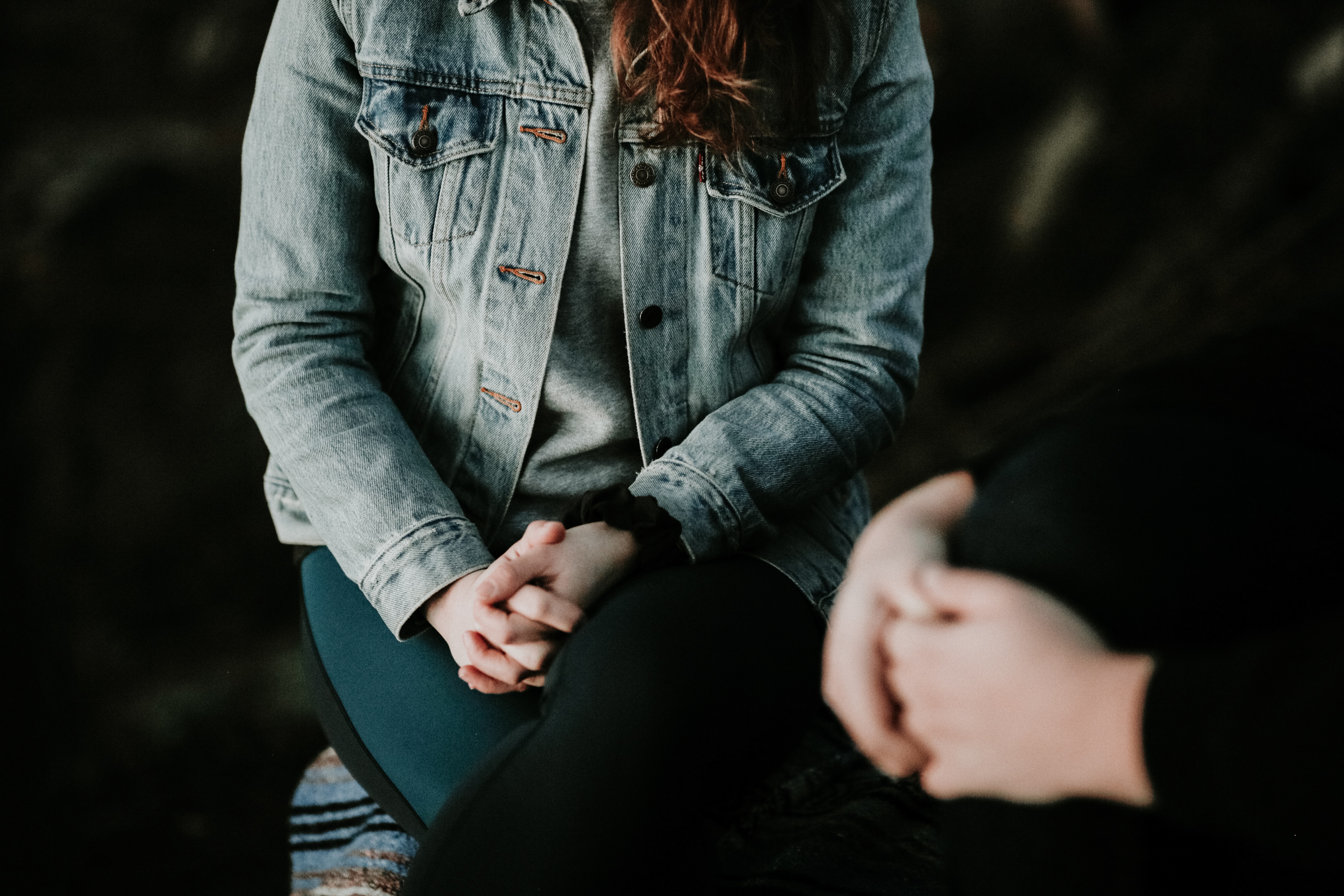 a woman talking to someone