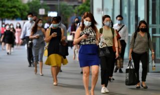 Singapore residents heading to work