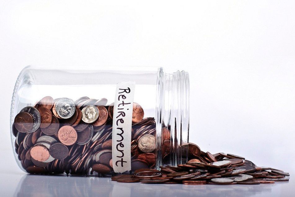 a spilled jar of retirement coins