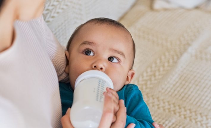 a baby drinking milk