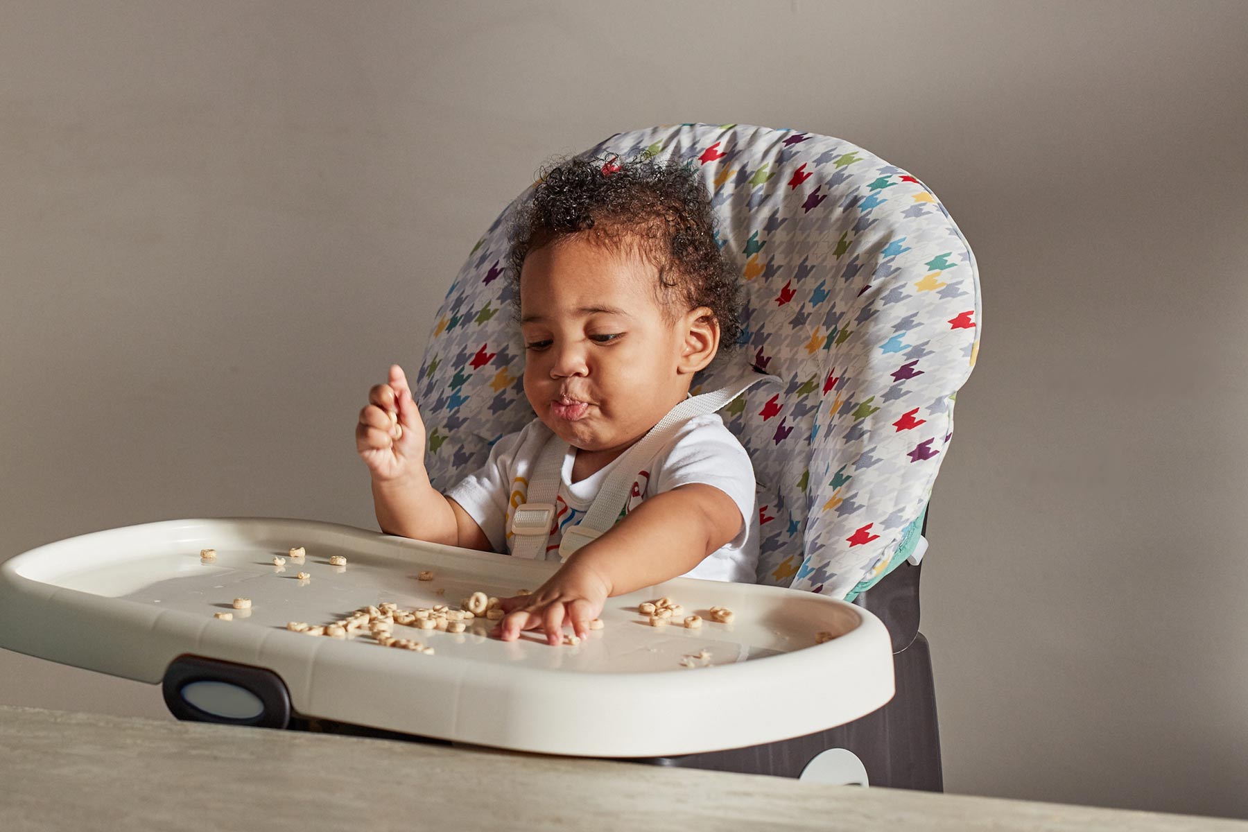 a child eating on his own