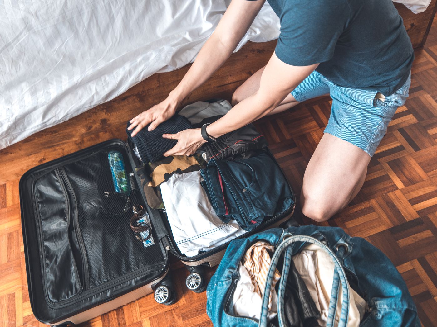 a guy packing for his trip