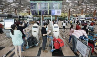 travelers at Changi Airport