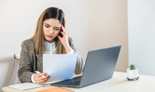 a job seeker looking at her resume