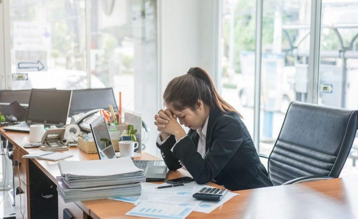 a woman stressed at work