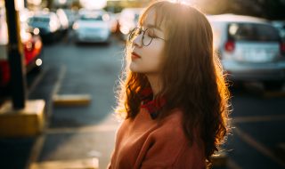 an Asian woman against a backlight