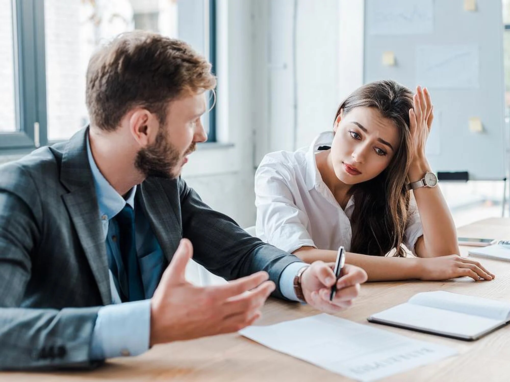 coworkers at disagreement with one another