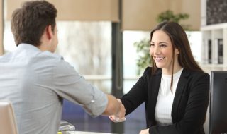 shaking hands during a job interview