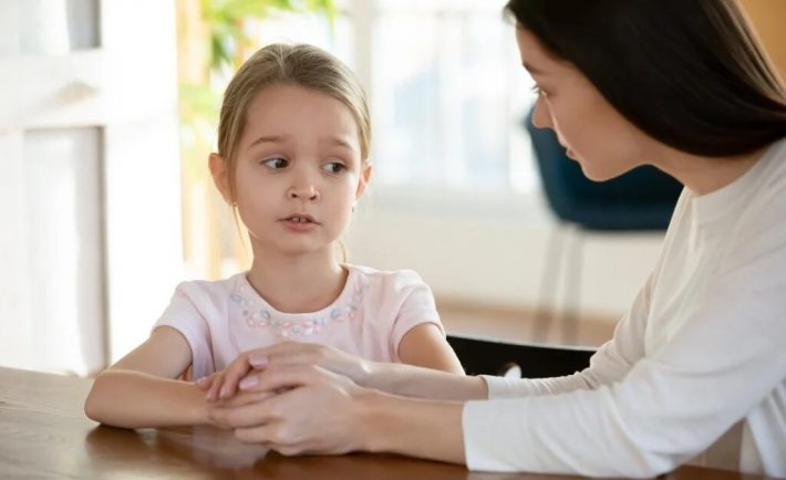 a mum talking to her daughter