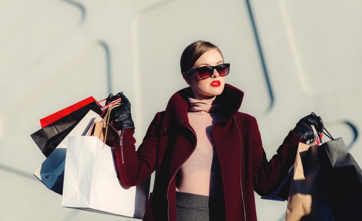 a woman with shopping bags