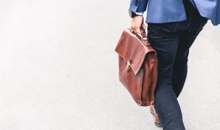 a man holding a briefcase