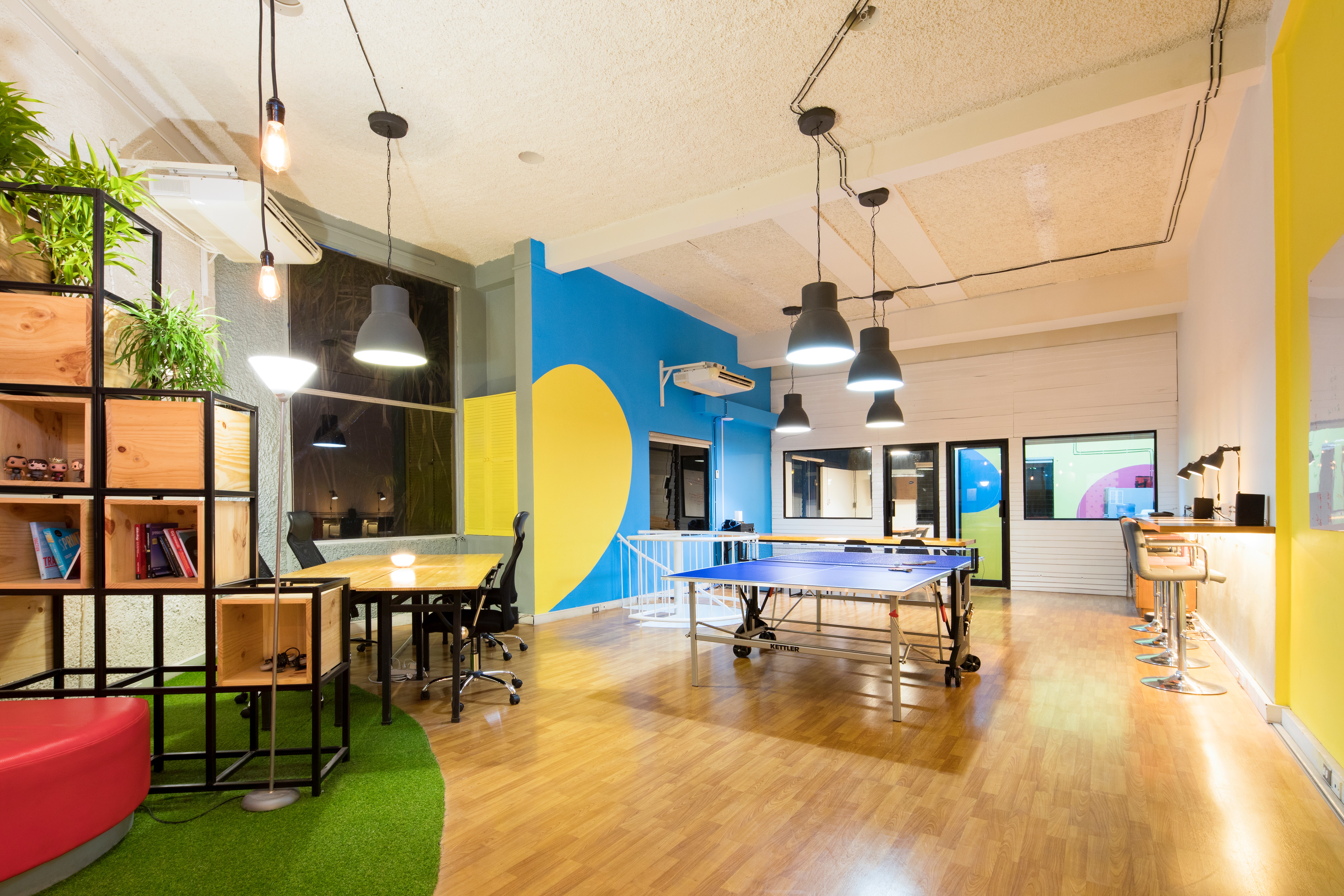 startup office with a ping-pong table and desk