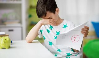 a boy upset with his test results