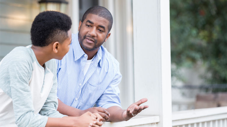 a father talking to his son