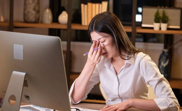 a lady stressed at work