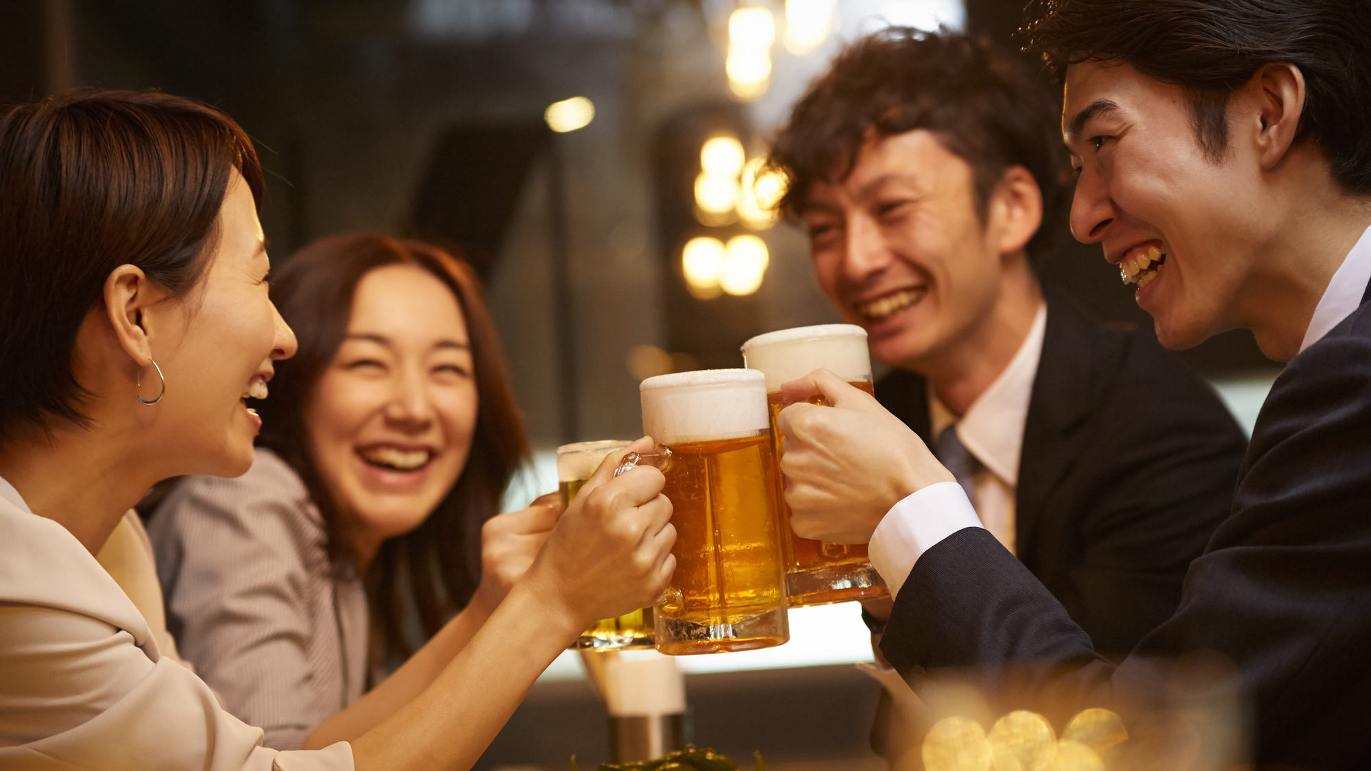 colleagues drinking beer together