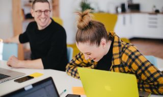 happy colleagues at work