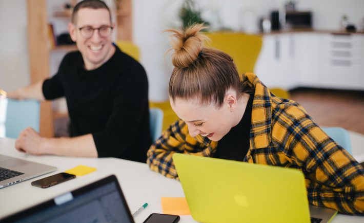 happy colleagues at work