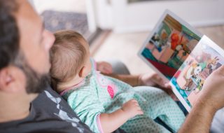 reading a book to a toddler
